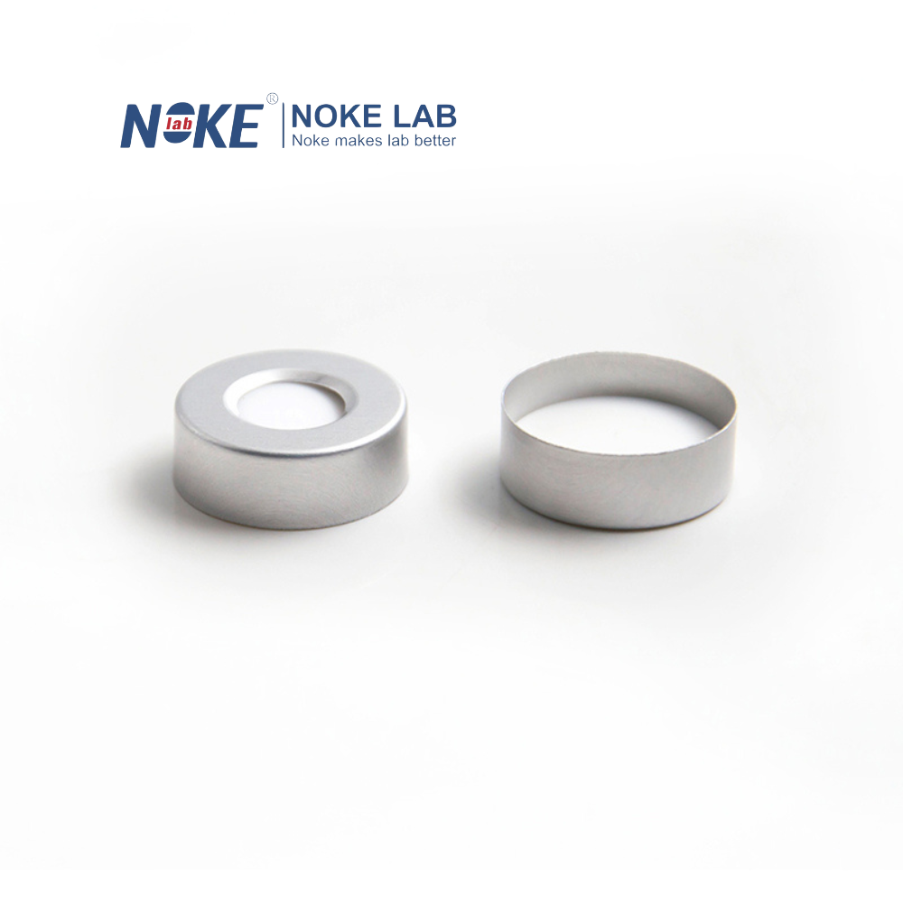 20 mm crimp‑top silver aluminum vial cap with 9.5 mm centre hole and white PTFE/silicone septa