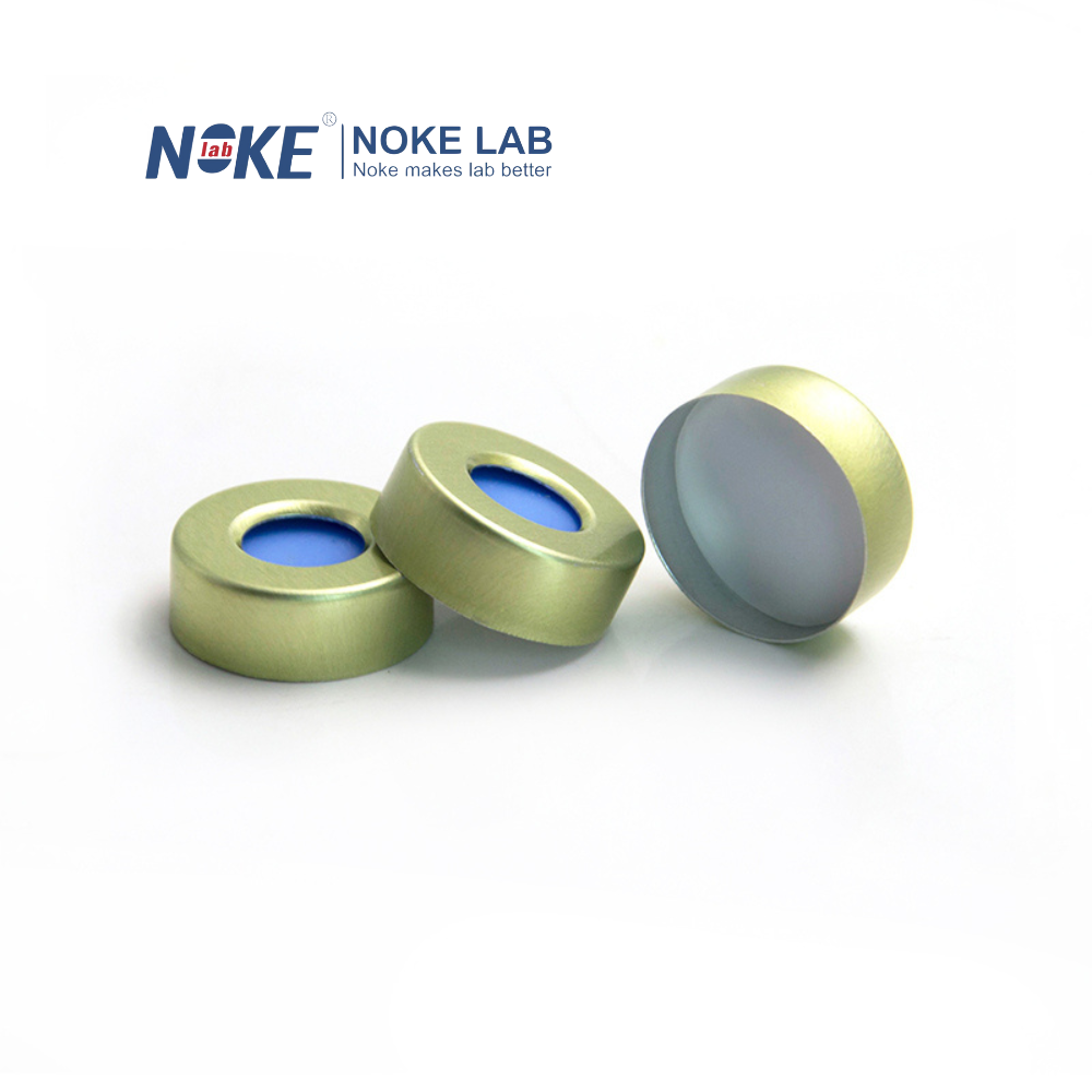 20 mm gold steel magnetic crimp cap with white PTFE/light blue silicone septa for headspace vials